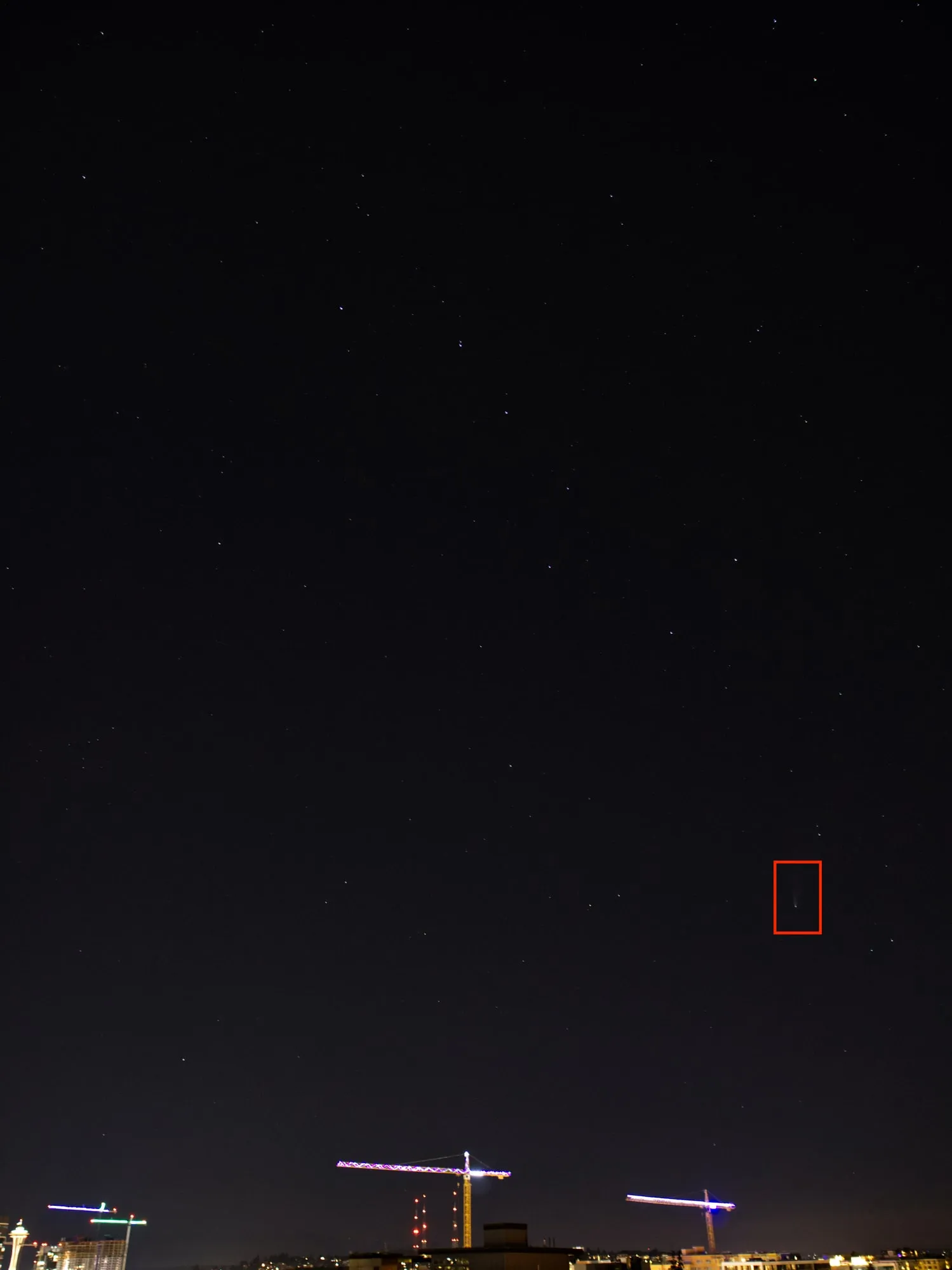 Space Needle for scale Comet NEOWISE over the Seattle skyline with the Space Needle